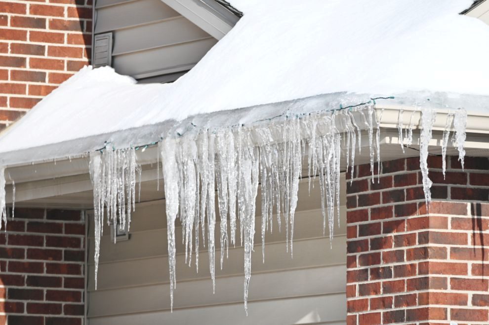 Water damage on a roof during winter in Port Orchard, Olympia & Aberdeen, WA